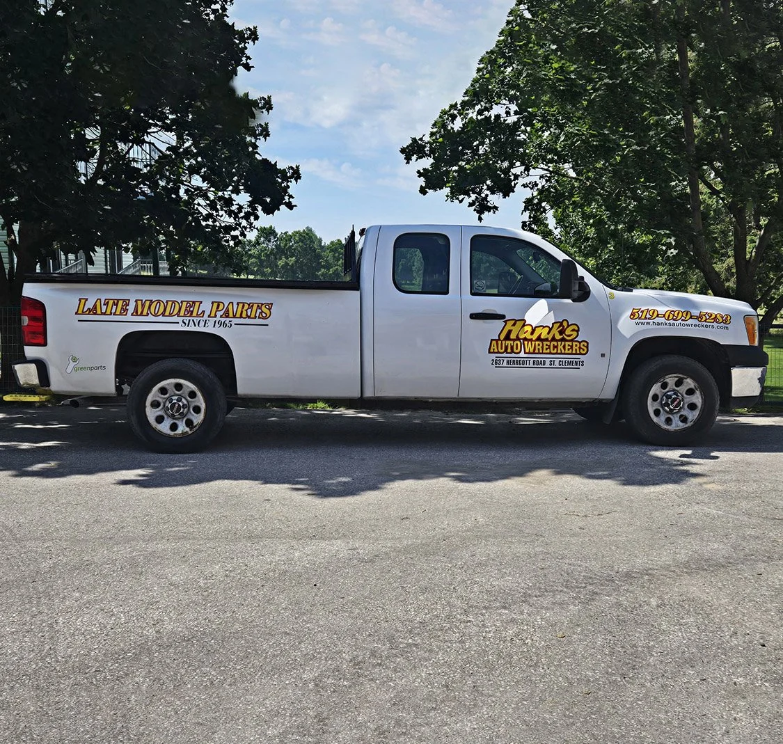 Business graphics applied to a pickup truck