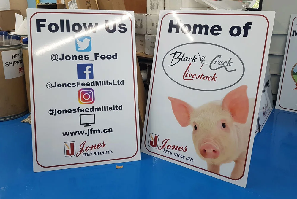 Printed promotional signs for a feed business