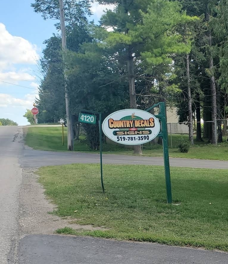 Country Decals roadside sign at the shop entrance